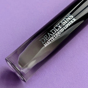 RIP grey matte liquid lipstick Deadly Sins Cosmetics Goth makeup tube closeup
